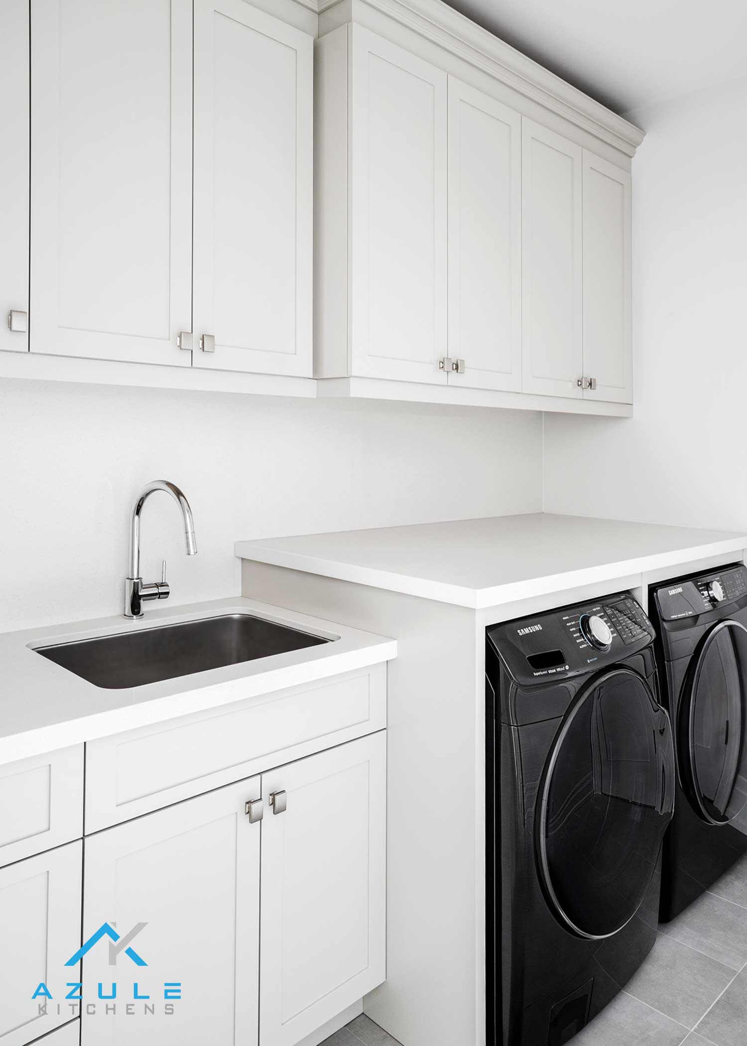 Built In Laundry Room With Quartz Countertops